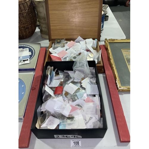 108 - A selection of world coins including commemorative and a wooden box