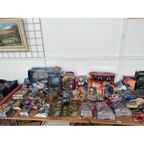 73 - A large collection of vintage action figures etc including Action Man, Transformers and Star Wars