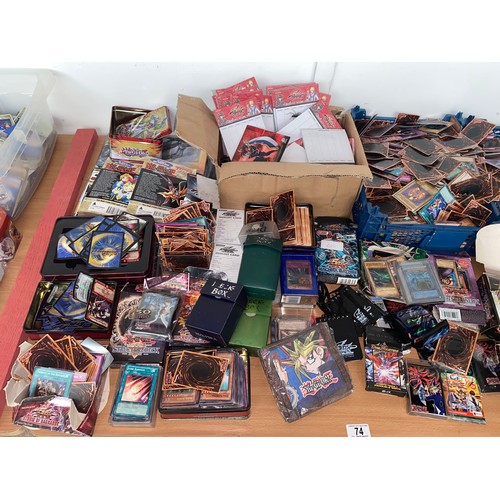 74 - A large quantity of Yu-Gi-Oh gaming cards, Duel Masters gaming cards, Duel Masters score pads etc.