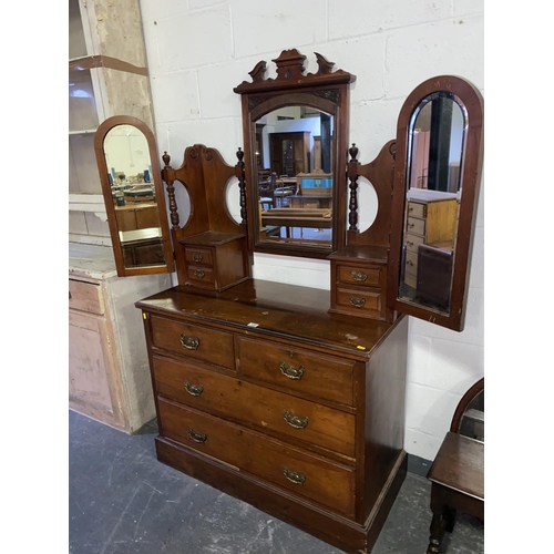 128 - A mahogany four drawer, triple mirror dressing chest