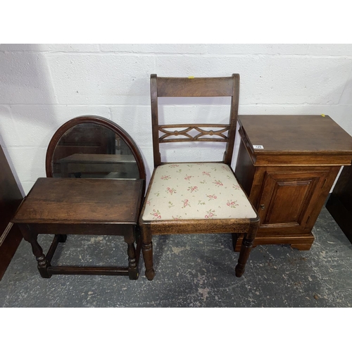 129 - A mahogany pot cupboard, oak side table and early Welsh chair and mirror