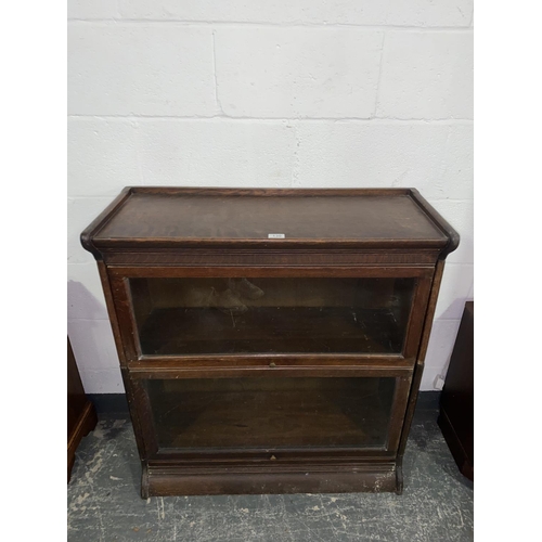 130 - A two section Globe Wernicke style oak bookcase