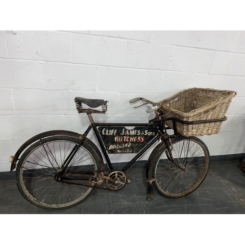 132 - An early shop / butchers bicycle with original basket and original sign writing