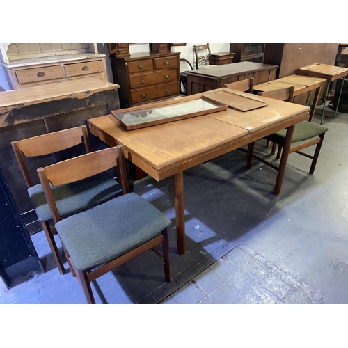 139 - A mid century teak White & Newton extending dining table and six chairs, Danish serving tray and a t... 