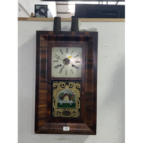 167 - An American 30 hour wall clock by Jerome & Co with painted panel