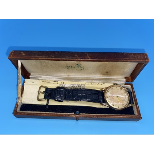 184 - A Smiths 9k gold gents watch in original leather box with receipts