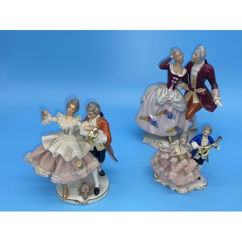 196 - A Royal Dux figurine and two Dresden figurines