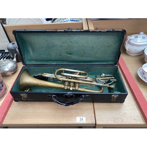 24 - A brass Invicta trumpet by Selmer, in case