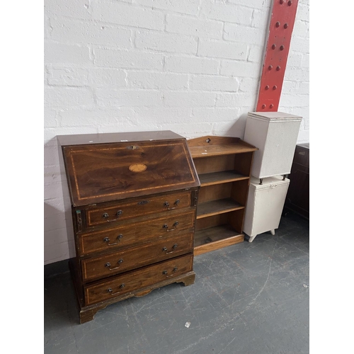 501 - A mahogany bureau, oak bookcase and two Lloyd loom style wicker baskets