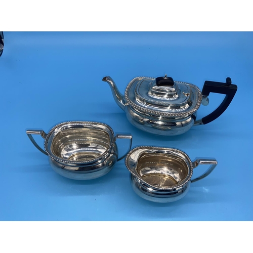 185 - A hallmarked silver three piece tea set compromising of teapot, milk/cream jug and sugar bowl. Hallm... 