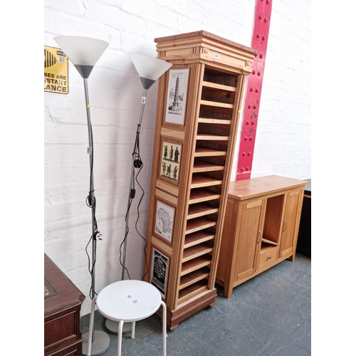 503 - Two standard lamps, stool, oak sideboard and a oak bookcase