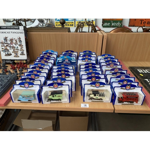 18 - A collection of Oxford Die-Cast vehicles including buses etc.
