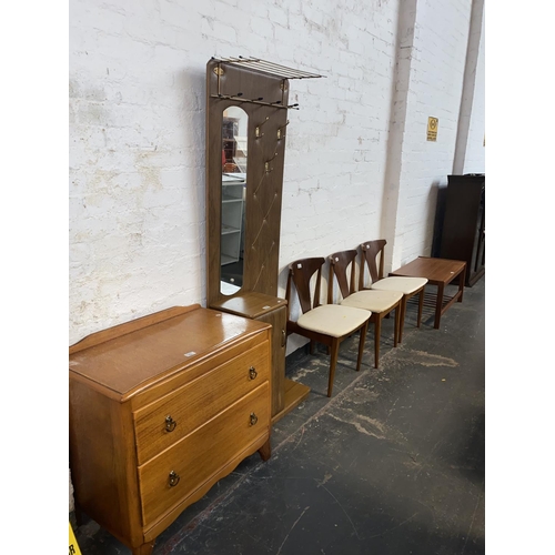 505 - A retro coat stand, chest of drawers, coffee table and three chairs