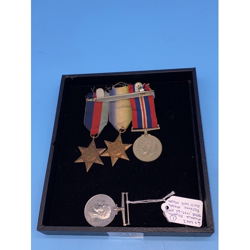 245 - A group of four WW2 medals, the War medal, the Defence medal, the 1939-1945 star and the Atlantic st... 