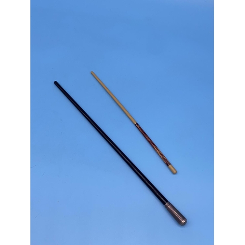 103 - An ebony conductors baton with hallmarked silver end mount London- 1928 , together with a smaller bo... 