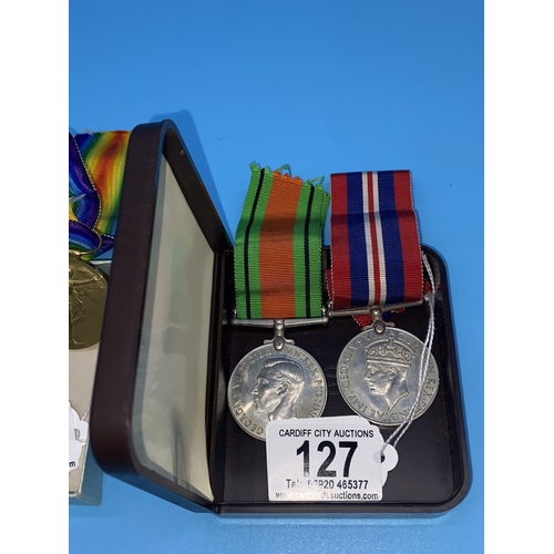 127 - A World War 2 war medal and The Defence medal