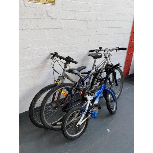 502 - Three bicycles ; A ladies 'Fasting' bike, A 'Saracen' gents bike and a child's 'Clone Trooper' bike