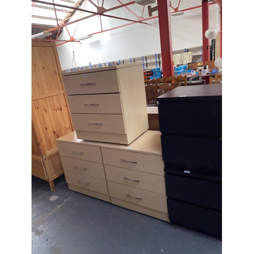 544 - Three pine effect chest of drawers and two black ash bedside cabinets
