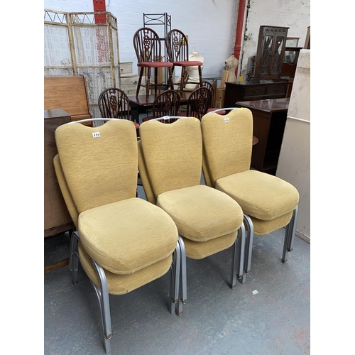 556 - Six metal frame stacking chairs