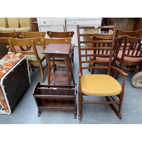 584 - A rocking chair, oak plant stand and a magazine rack