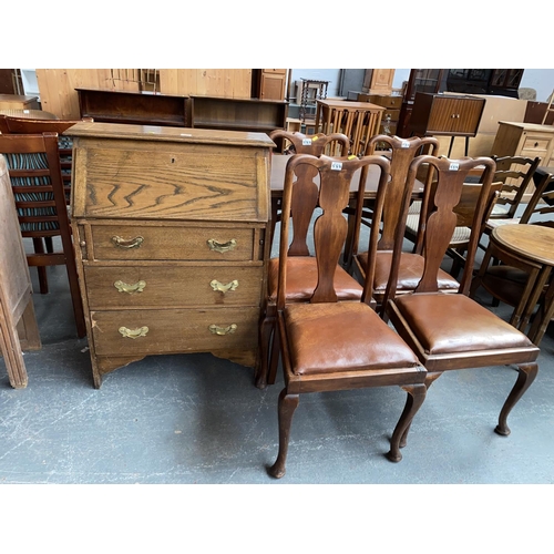 588 - A bureau and four oak dining chairs