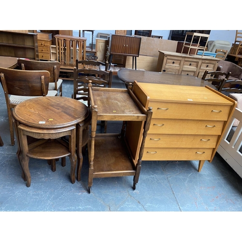 589 - A tea trolley, nest of tables and a retro chest of drawers