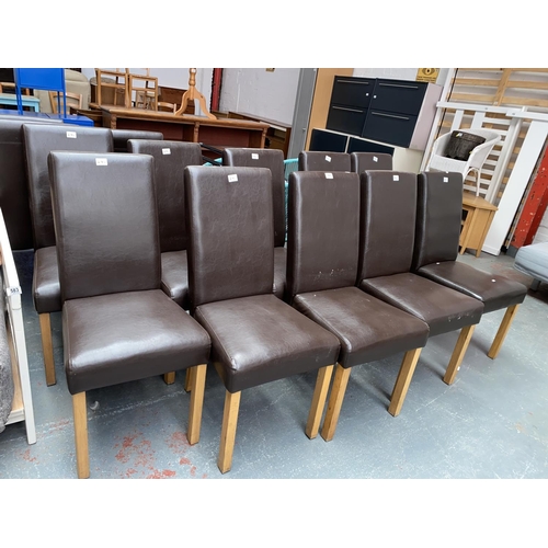 591 - 10 faux leather dining chairs