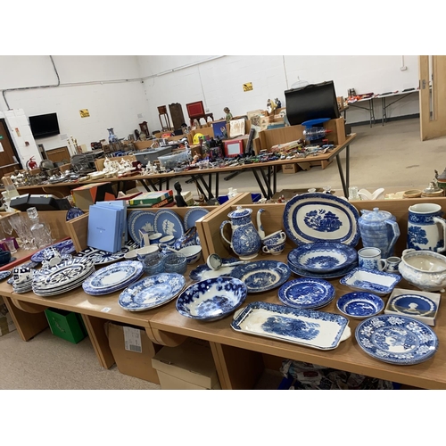 41 - A large selection of Blue and White china including Old Willow, Wedgwood etc.