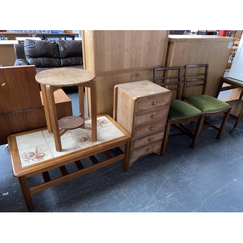 541 - A retro tiled top coffee table, side table, small chest of drawers and two dining chairs