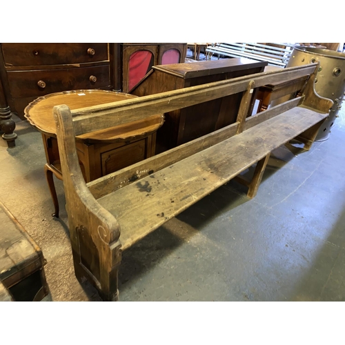 128 - A pine church pew (108 inches long)