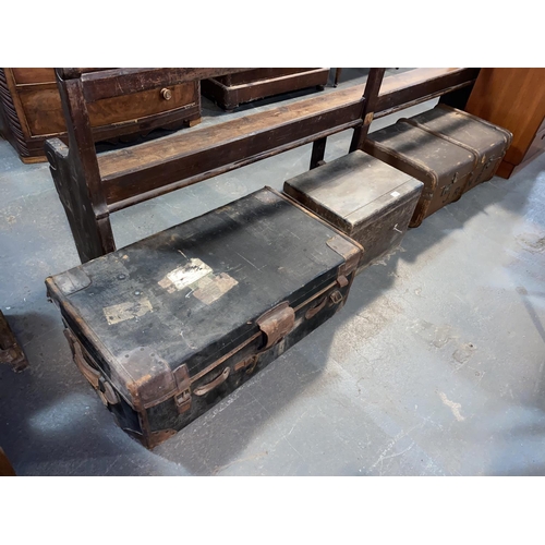 132 - Two travel trunks and a wooden carpenters box