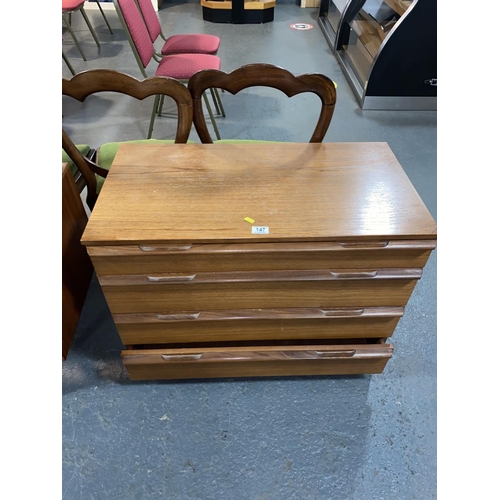 147 - A mid century teak four drawer chest of drawers