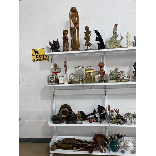 57 - Wooden figures, oil lamps, mantle clocks, anniversary clocks etc.