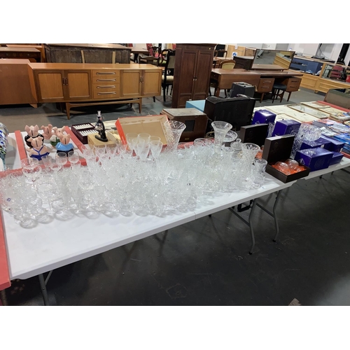 87 - A large quantity of crystal glasses, vases, bowls etc including boxed Edinburgh and Webb crystal