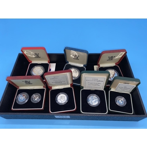 163 - A collection of Royal Mint sterling silver (925) proof collectors coins in boxes and with paperwork-... 