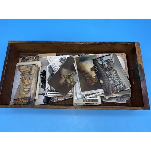 187 - A quantity of early postcards