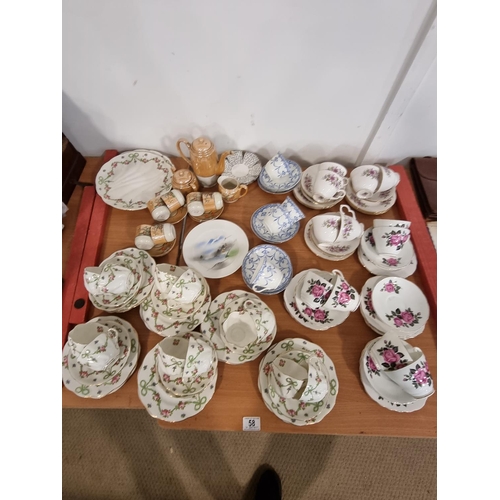 58 - A collection of mixed china including tea sets etc.