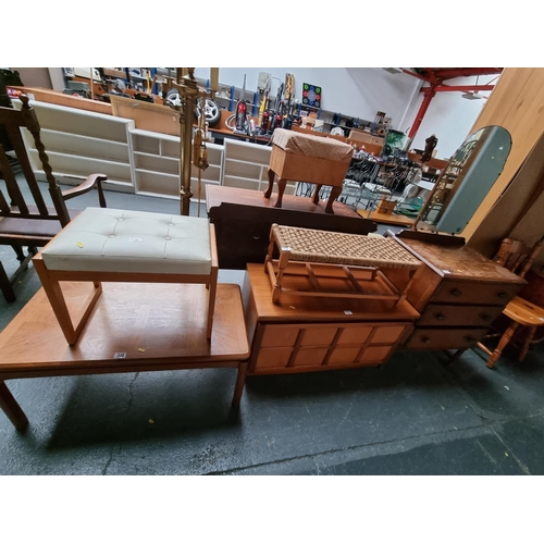 338 - A Nathan coffee table, oak dressing table, Nathan cabinet and two stools