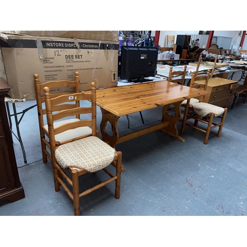 456 - A pine dining table and four chairs
