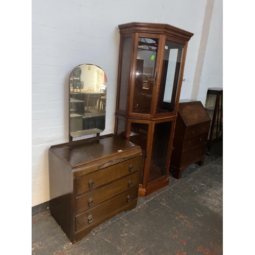 508 - Oak dressing table and mirror, mahogany bureau and a hardwood display cabinet
