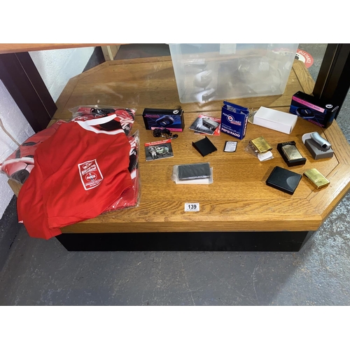 139 - Malbro Zippo Lighter, Pepsi radios, Champ golden Virginia lighters, Coca cola new Euro 96 t shirts e... 