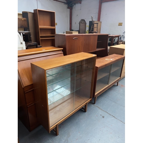 483 - A teak hi -board, teak bureau and two teak display cabinets