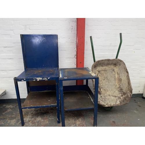 486 - Two metal work tables and a wheelbarrow