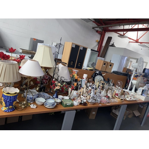 495 - A large collection of mixed glass and china, lamps etc  including crystal bells, Sylvac commemorativ... 