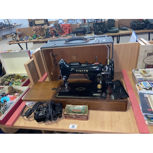 20 - A Singer 99k sewing machine in case with accessories