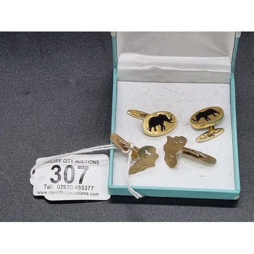 307 - Two pairs of 9k gold cufflinks - one being the shape of Africa and the other with elephants in black... 