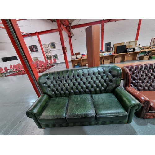 176 - A green leather Chesterfield three seater sofa
