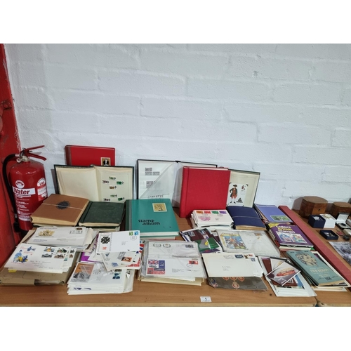 1 - A collection of World stamps - predominantly British, some First Day Covers, catalogues and albums