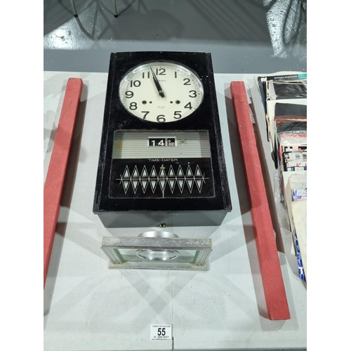 55 - A Seiko 30 day wall hanging time dater clock together with a Seiko desk clock