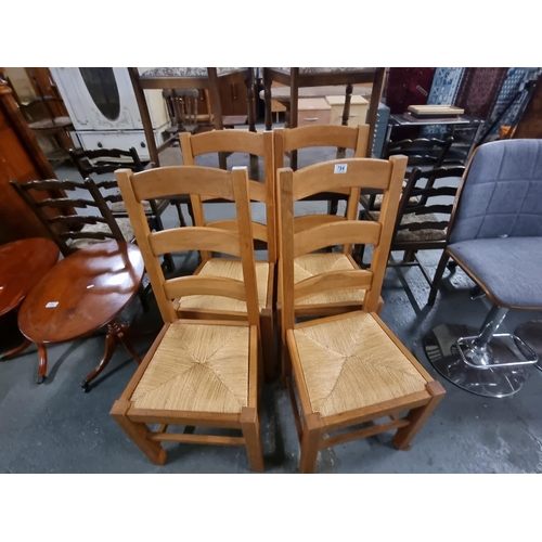 784 - 4 pine chairs with wicker seat